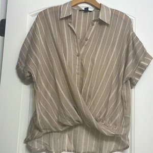 A loose fitting, see through blouse from Forever 21.
